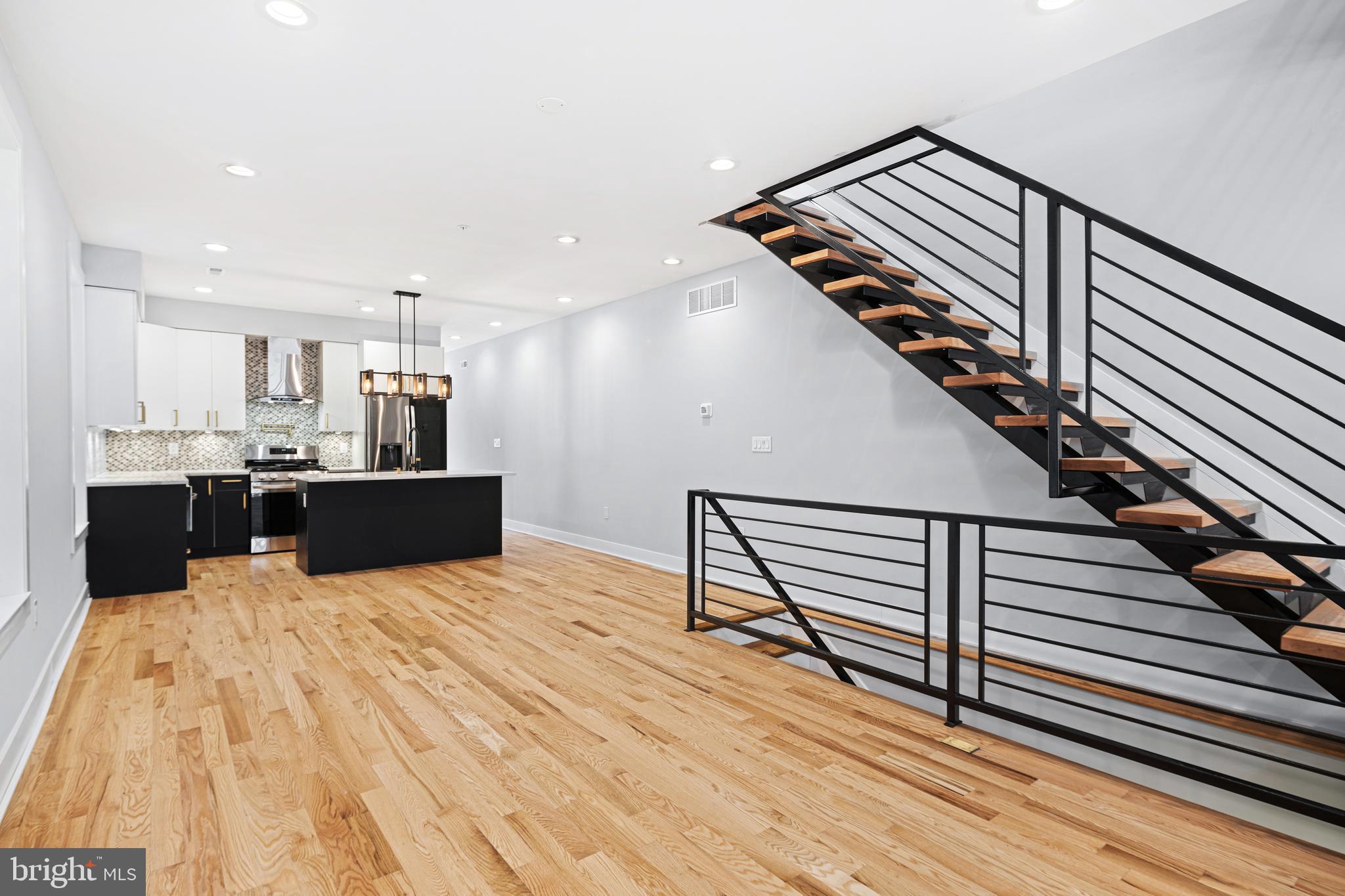1124 Divinity Street Philadelphia, PA 19143 - Photo 4 of 37 a view of kitchen with sink and microwave
