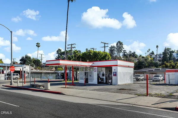a view of street with sitting area