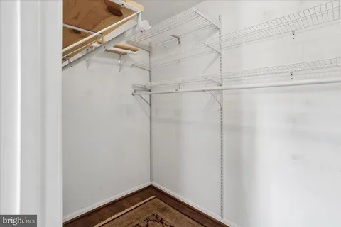 a view of a room with racks on the wall