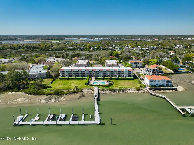 a view of a garden with a lake view