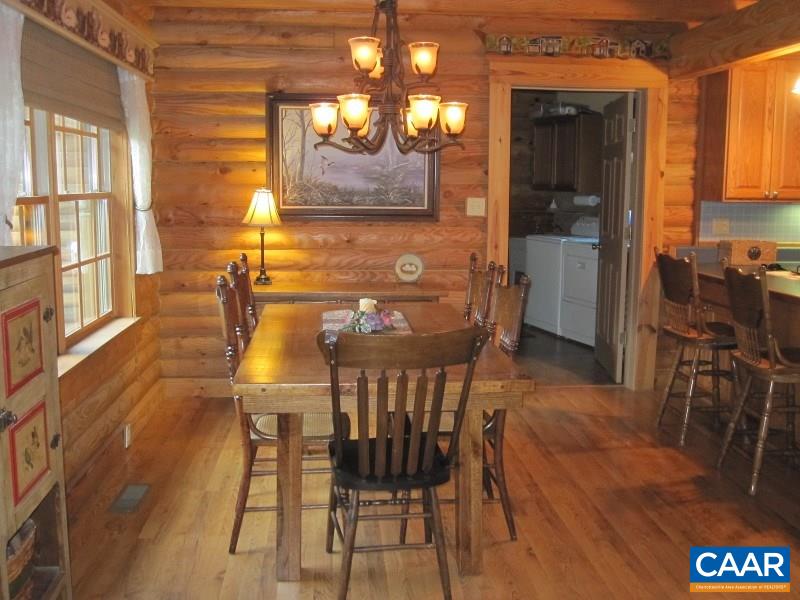 991 Sulphur Spring Road Prospect, VA 23960 - Photo 12 of 45 a view of a dining room with furniture and wooden floor