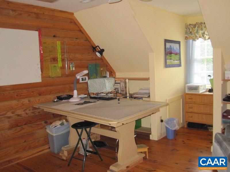 991 Sulphur Spring Road Prospect, VA 23960 - Photo 21 of 45 a view of a dining table and chairs in a room