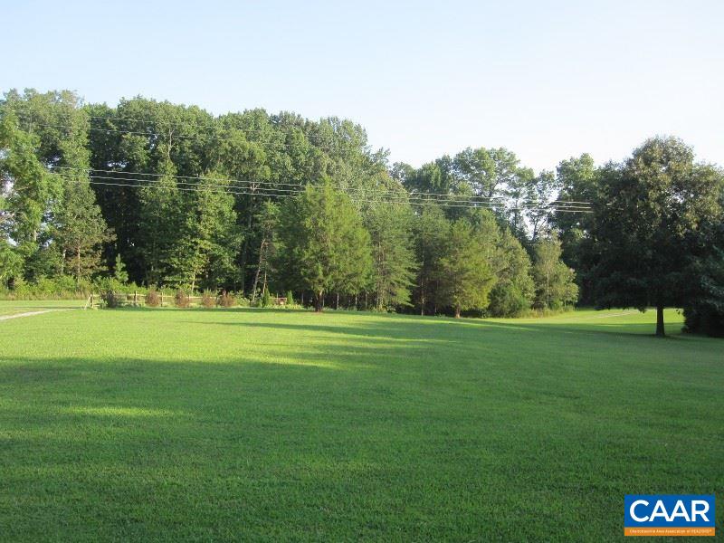 991 Sulphur Spring Road Prospect, VA 23960 - Photo 37 of 45 a view of a golf course with a lake