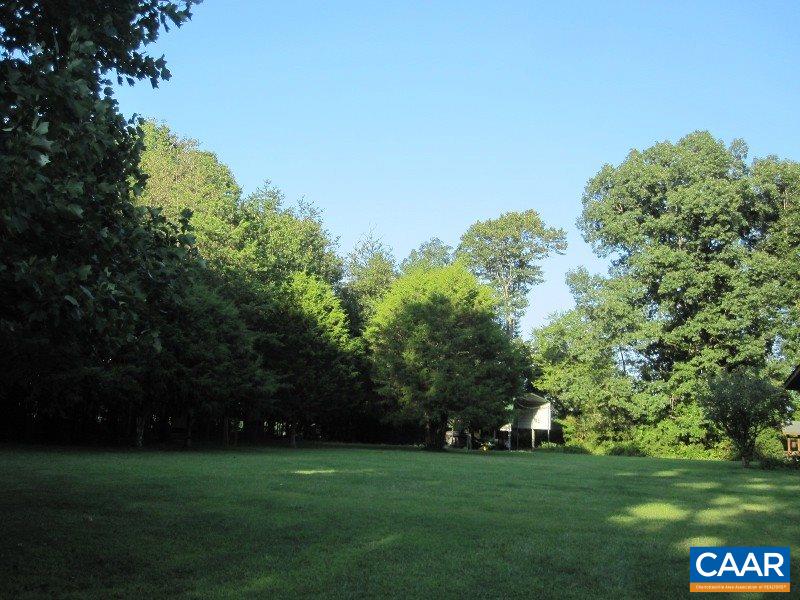 991 Sulphur Spring Road Prospect, VA 23960 - Photo 38 of 45 a view of a golf course with a lake