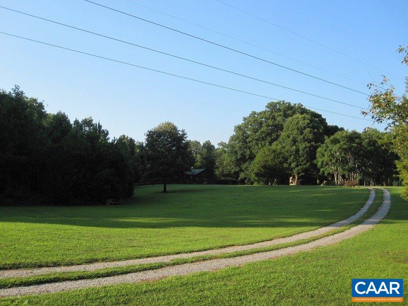 991 Sulphur Spring Road Prospect, VA 23960 - Photo 5 of 45 a view of a golf course with a big yard