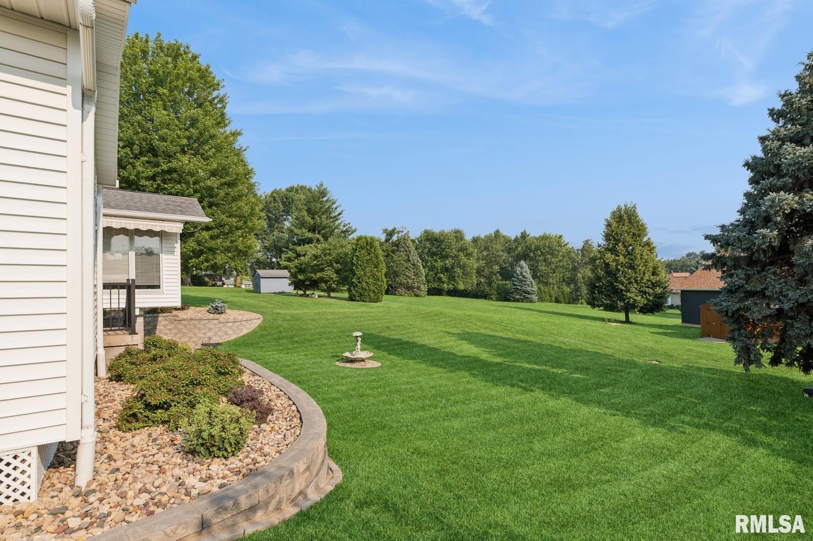 1825 5th Avenue South Clinton, IA 52732 - Photo 26 of 34 a view of a garden with basketball court