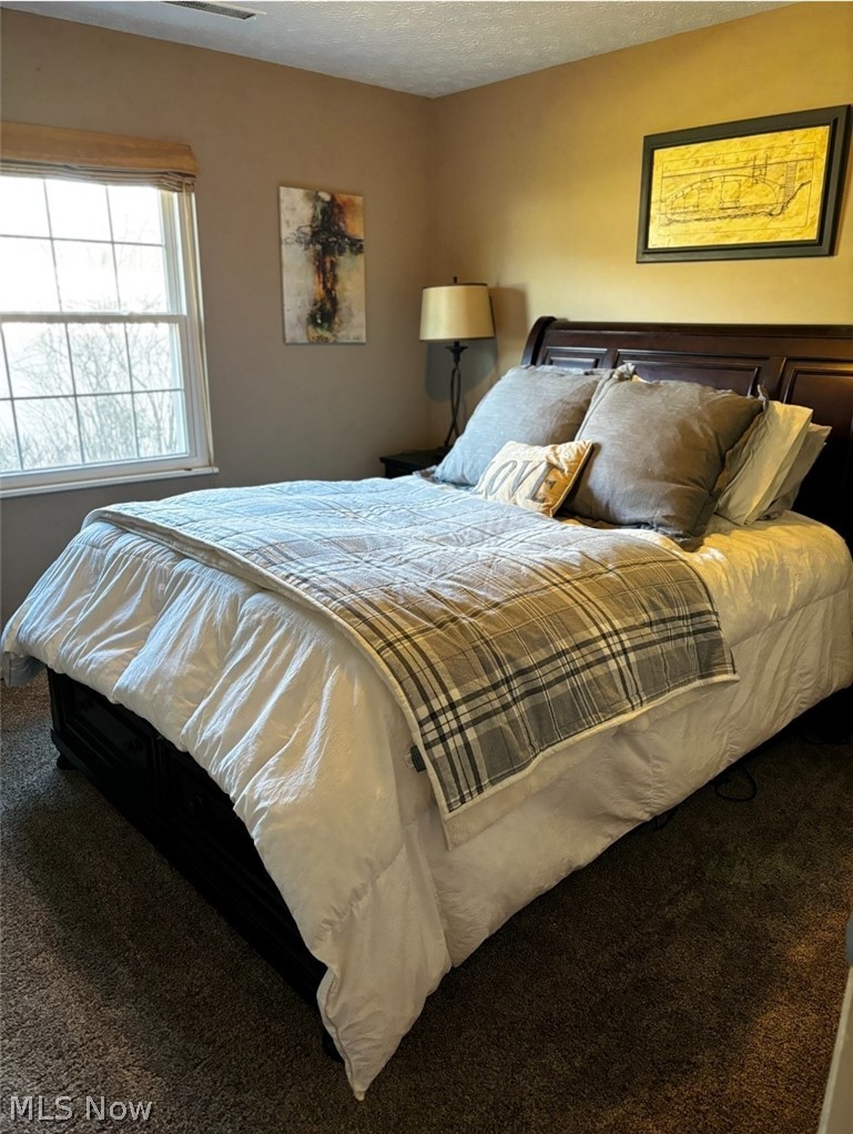 2514 Raber Road, Unit 4A Uniontown, OH 44685 - Photo 9 of 13 Bedroom featuring carpet