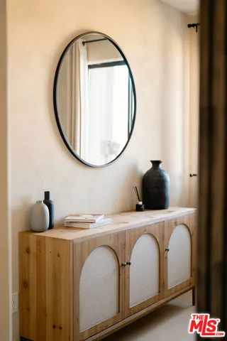 a close view of a utility room with dryer and washer