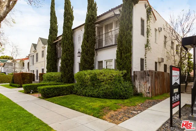 a view of a house with a garden