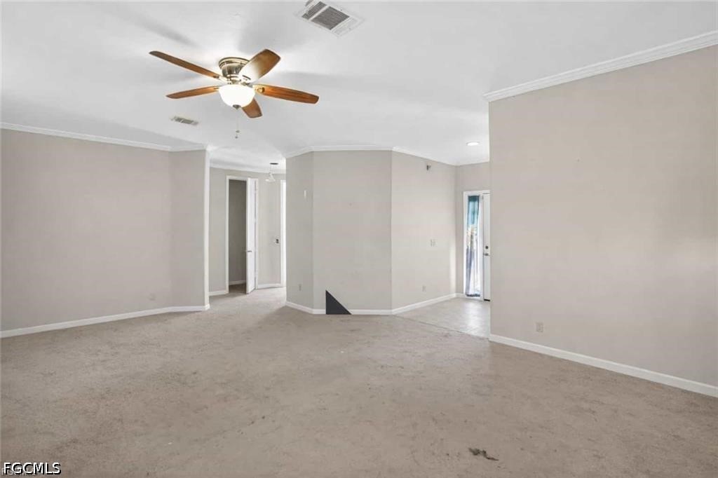 2808 34th Street Southwest Lehigh Acres, FL 33976 - Photo 12 of 14 an empty room with closet and fan