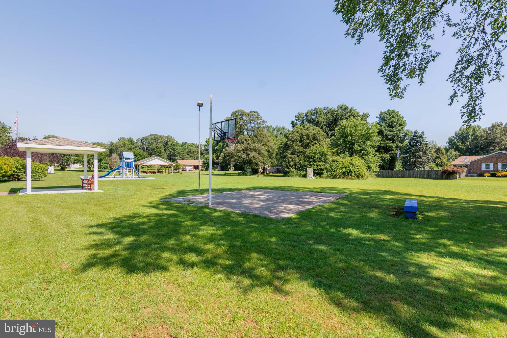 Comm. Area - Covered Bus Stop - Basketball Ct.