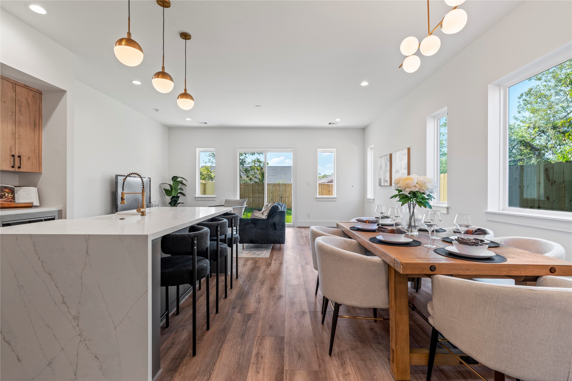 4218 Nichols Street Houston, TX 77020 - Photo 1 of 45 a view of a dining room with furniture window and wooden floor