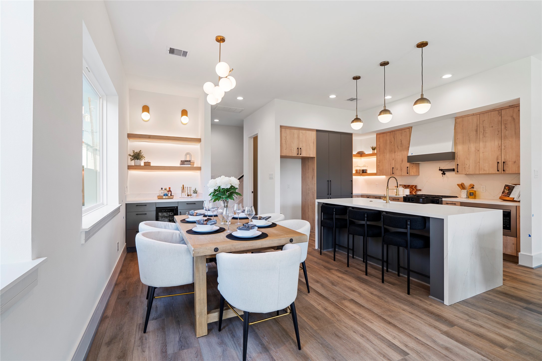4218 Nichols Street Houston, TX 77020 - Photo 11 of 45 a large kitchen with a table and chairs