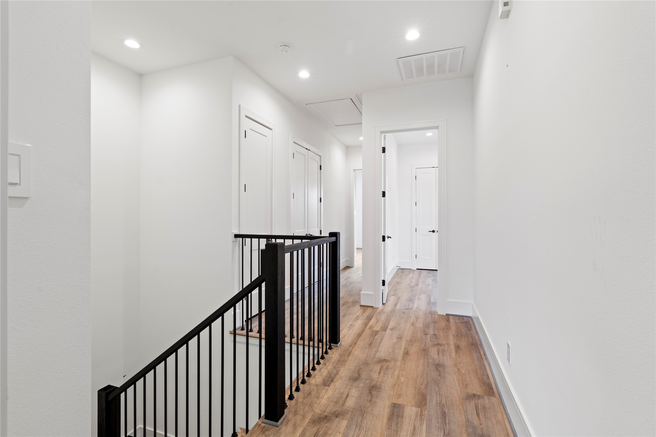 4218 Nichols Street Houston, TX 77020 - Photo 20 of 45 a view of a hallway with wooden floor