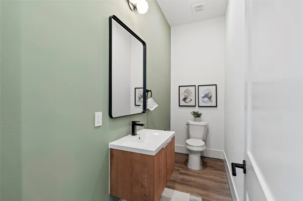 a bathroom with a sink and a toilet