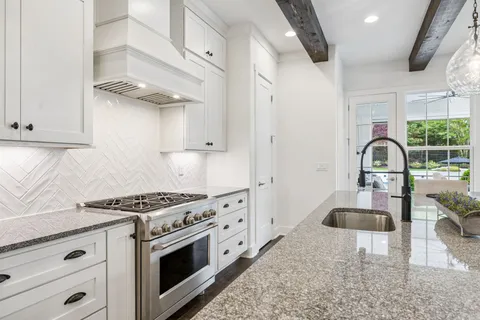 a bathroom with a shower and a toilet