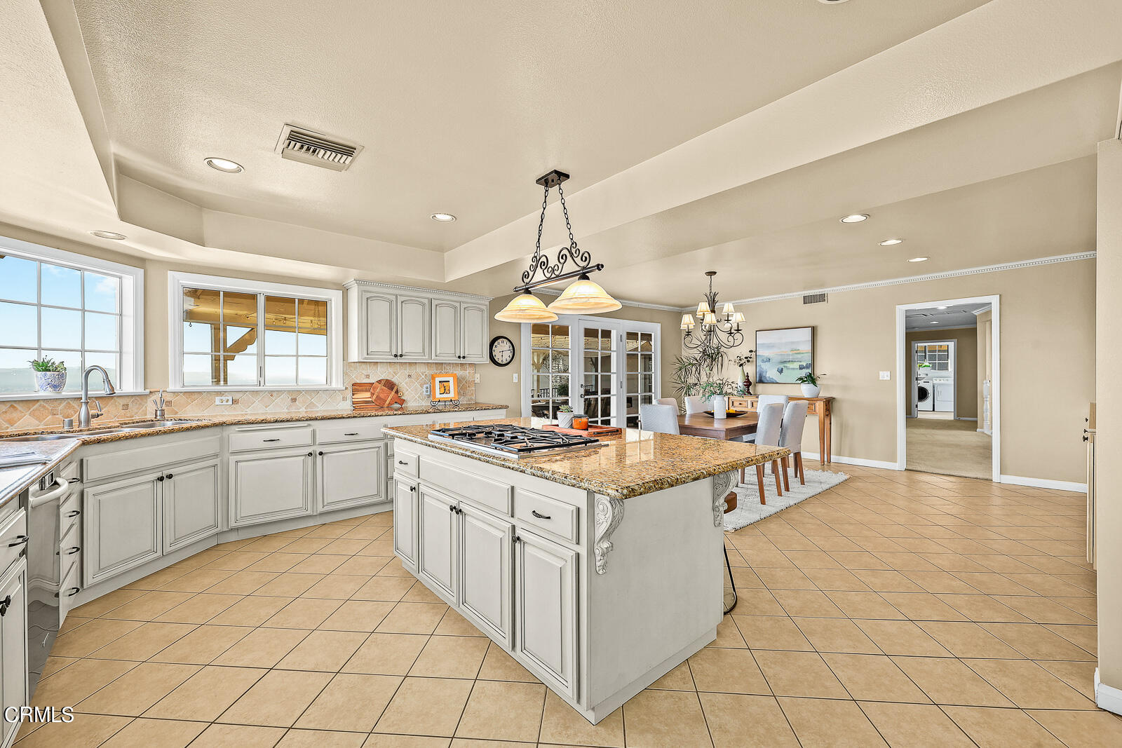 Undisclosed Address Burbank, CA 91501 - Photo 17 of 70 a kitchen with stainless steel appliances granite countertop a stove and cabinets