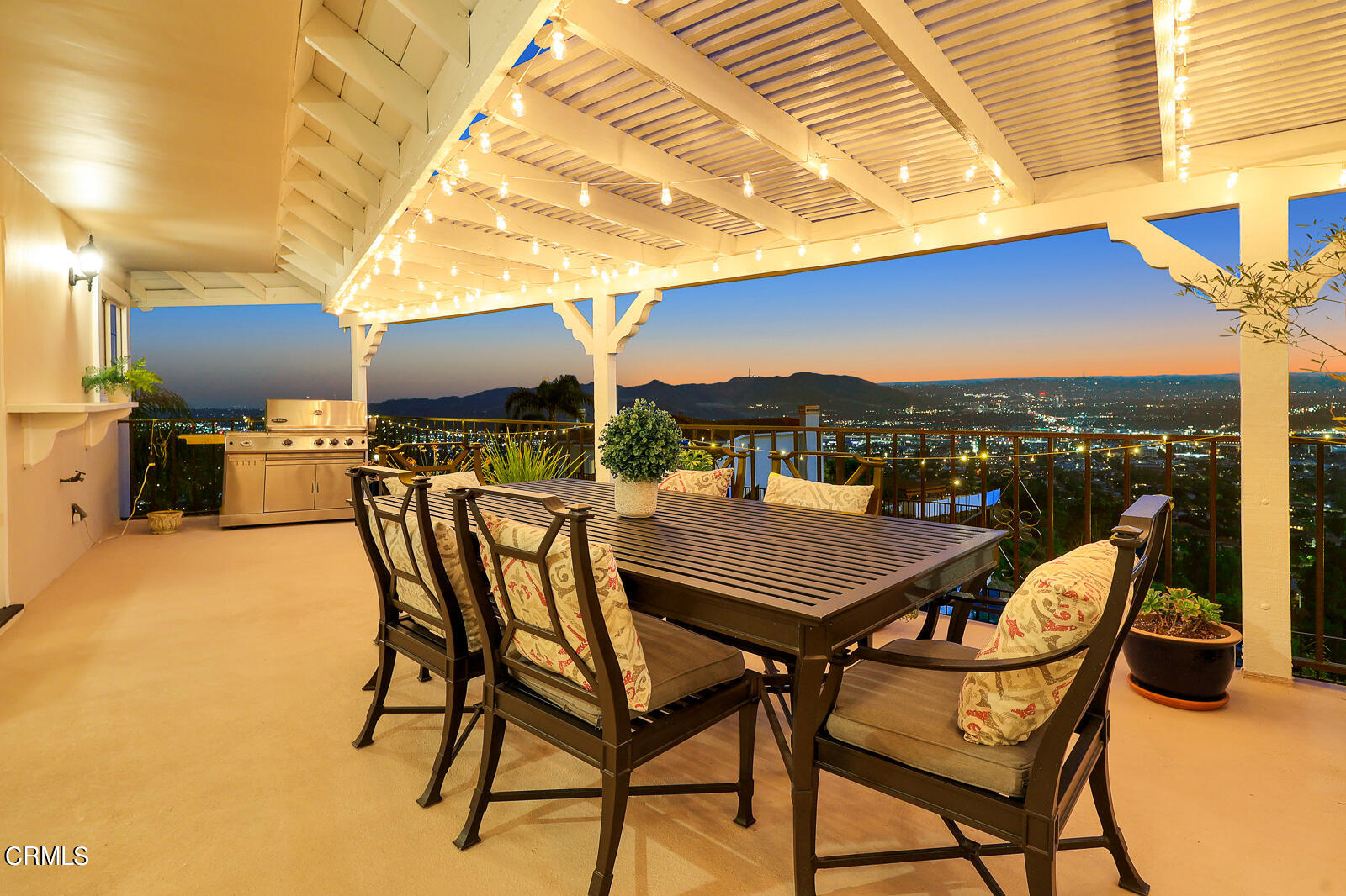 Undisclosed Address Burbank, CA 91501 - Photo 24 of 70 a view of a patio with a table and chairs under an umbrella