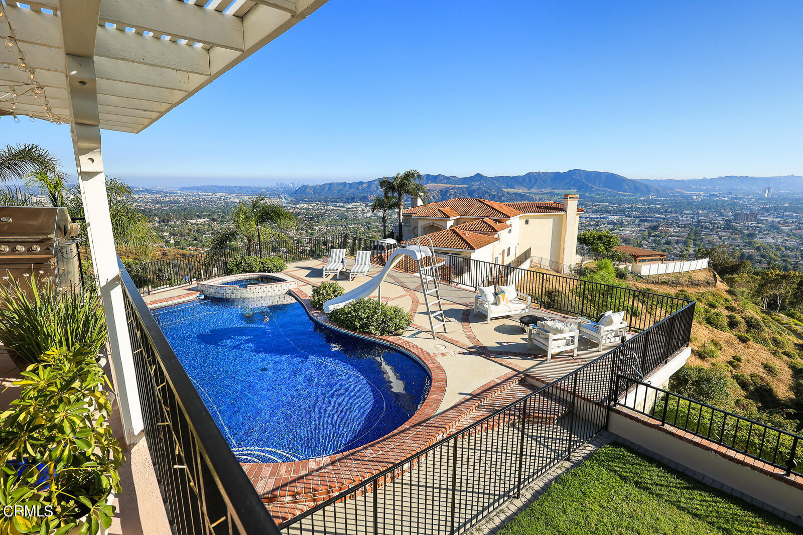 Undisclosed Address Burbank, CA 91501 - Photo 27 of 70 a view of a balcony with two chairs and a potted plant