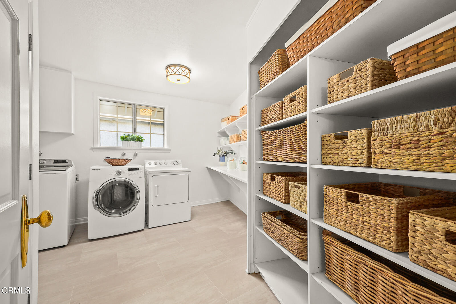 Undisclosed Address Burbank, CA 91501 - Photo 30 of 70 a utility room with cabinets