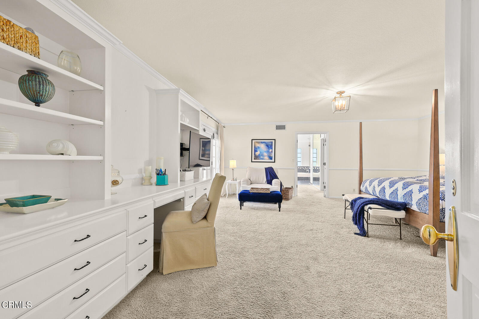Undisclosed Address Burbank, CA 91501 - Photo 31 of 70 a living room with furniture and a lamp on dresser next to a window