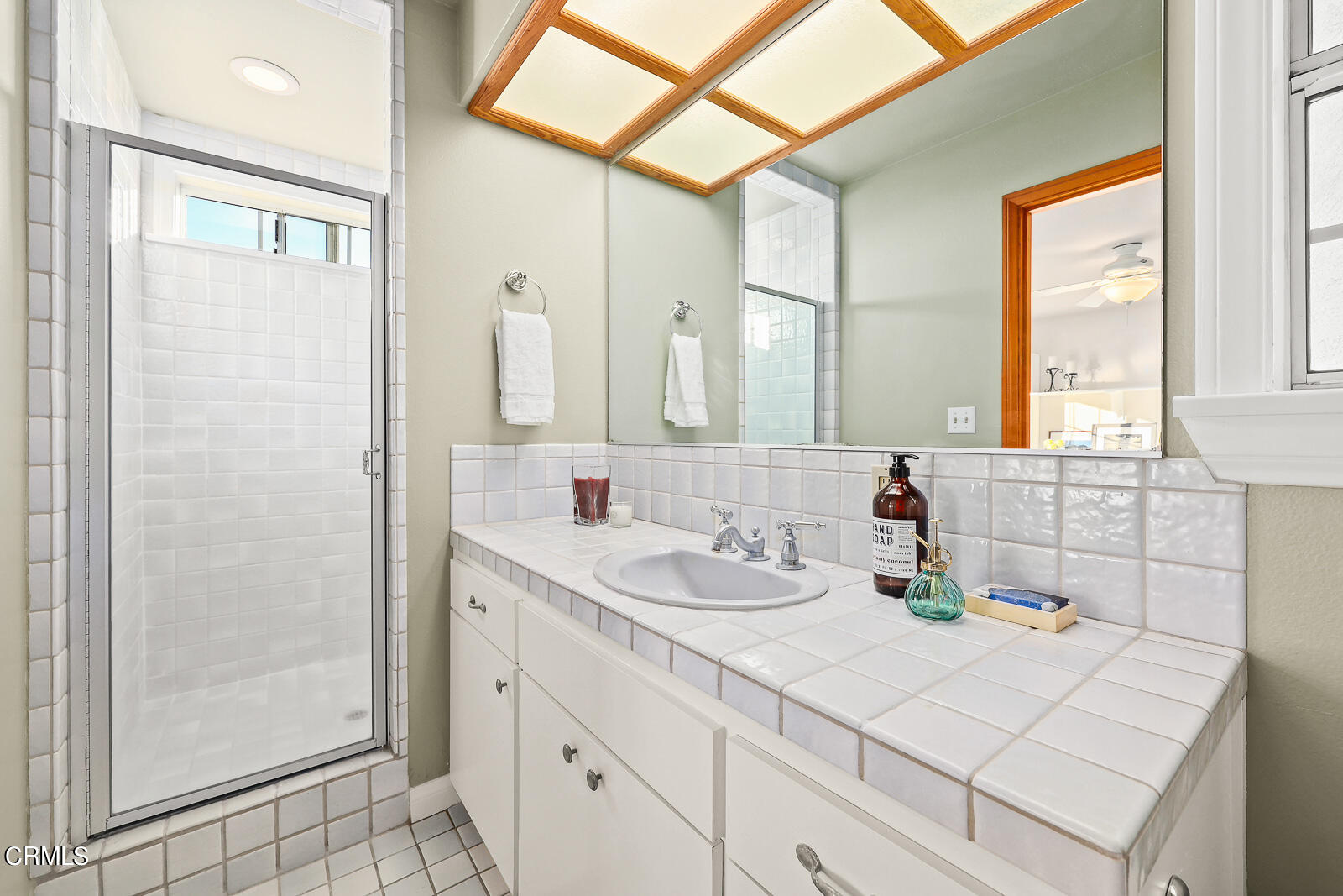 Undisclosed Address Burbank, CA 91501 - Photo 43 of 70 a bathroom with a sink and a mirror