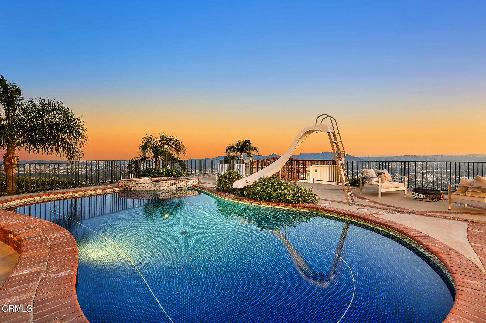 Undisclosed Address Burbank, CA 91501 - Photo 53 of 70 a view of a swimming pool with a lounge chair