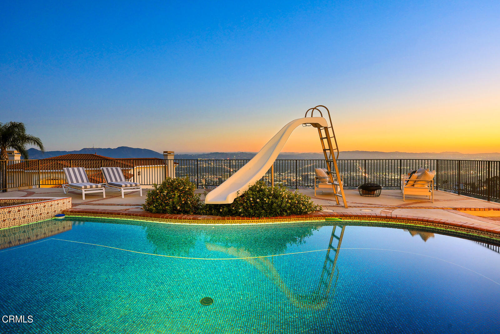 Undisclosed Address Burbank, CA 91501 - Photo 54 of 70 a view of a swimming pool with a garden and plants