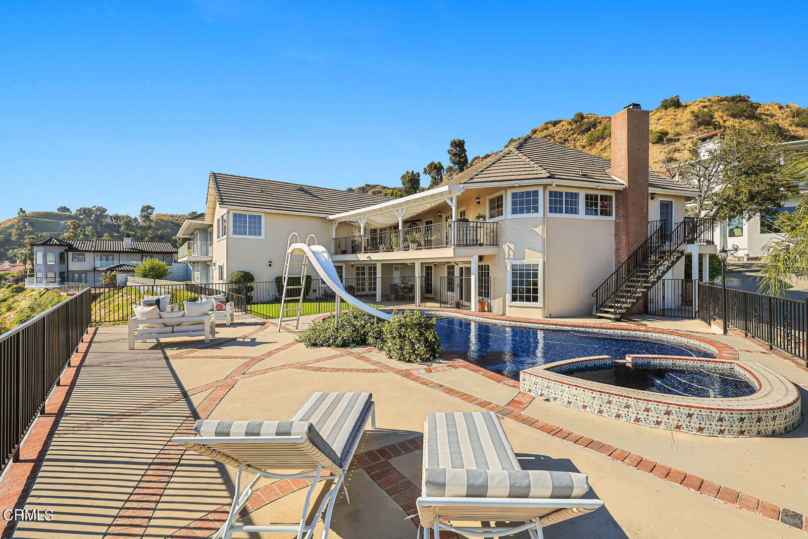 Undisclosed Address Burbank, CA 91501 - Photo 58 of 70 a front view of a house with swimming pool