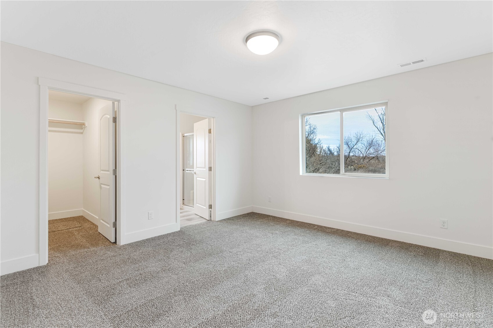 308 North Sandy Loop Moses Lake, WA 98837 - Photo 12 of 18 an empty room with windows
