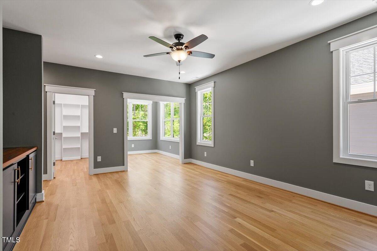 3934 Old Chapel Hill Road Durham, NC 27707 - Photo 26 of 47 a view of an empty room with a window and wooden floor