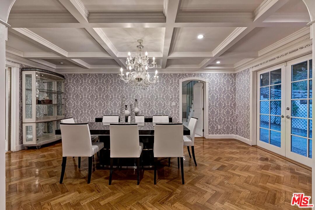 725 North Faring Road Los Angeles, CA 90077 - Photo 22 of 56 a view of a dining room with furniture