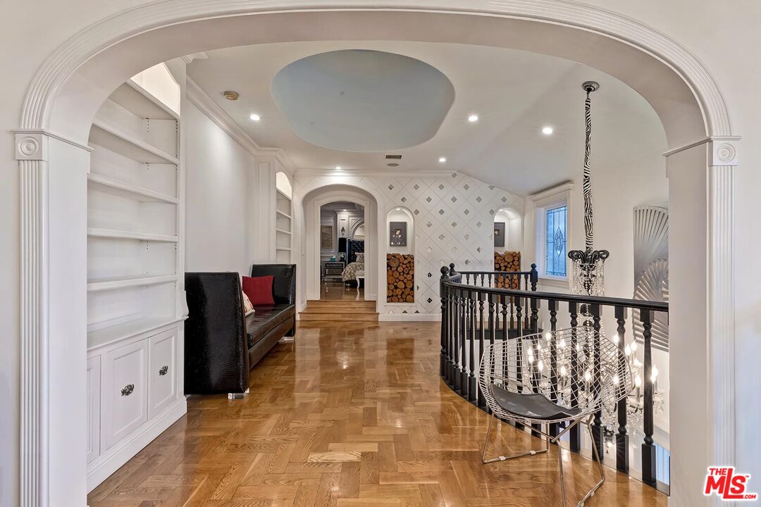 725 North Faring Road Los Angeles, CA 90077 - Photo 34 of 56 a view of entryway with livingroom and chandelier