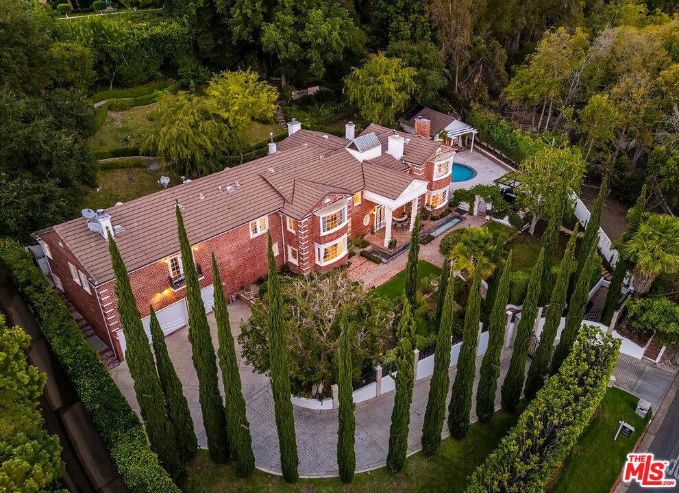 725 North Faring Road Los Angeles, CA 90077 - Photo 4 of 56 a aerial view of a house with garden space and street view
