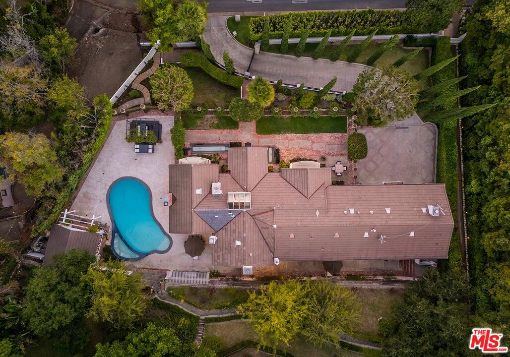 725 North Faring Road Los Angeles, CA 90077 - Photo 5 of 56 an aerial view of a house with swimming pool and outdoor space
