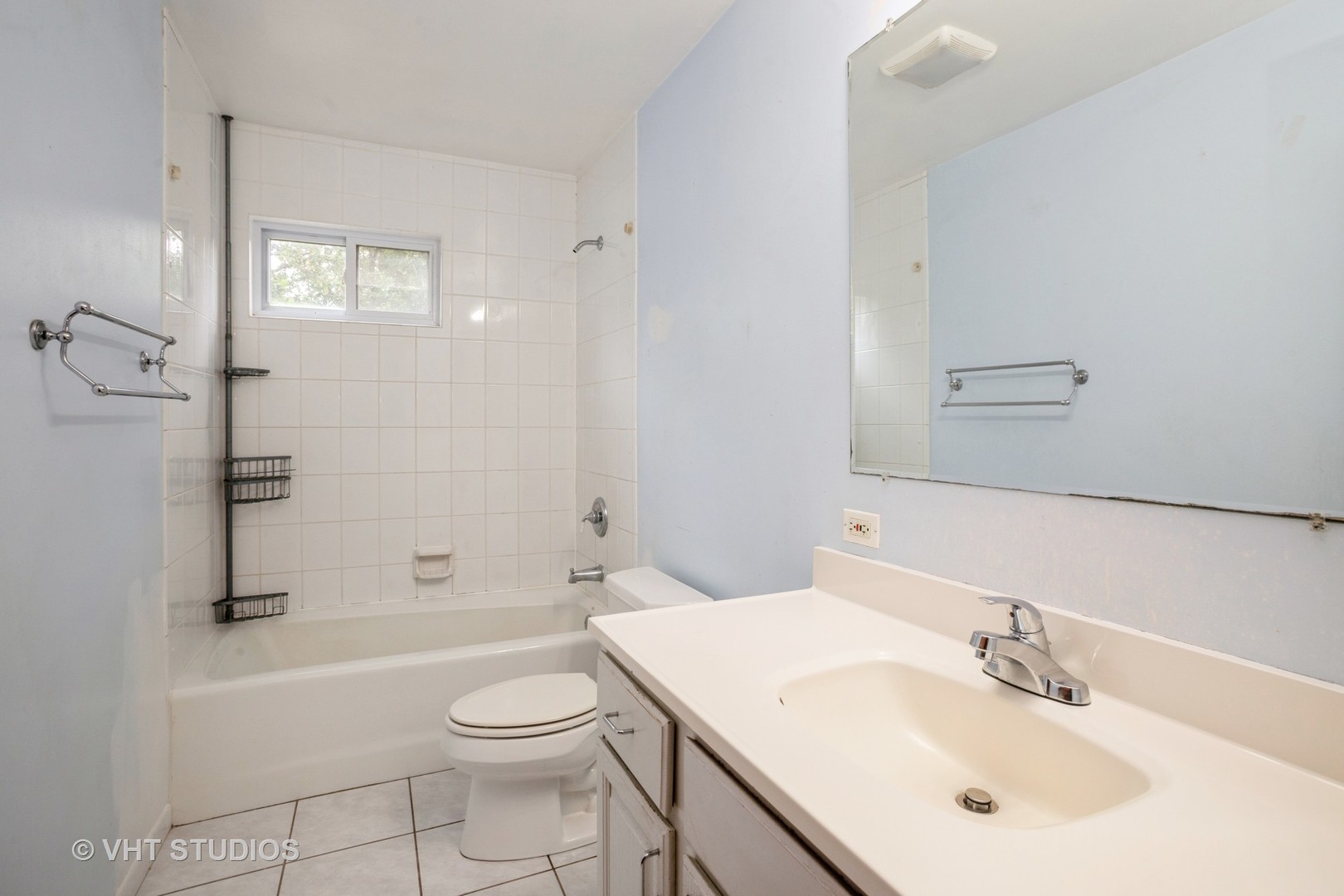 329 South Maple Street Itasca, IL 60143 - Photo 6 of 10 a bathroom with a sink a toilet and shower