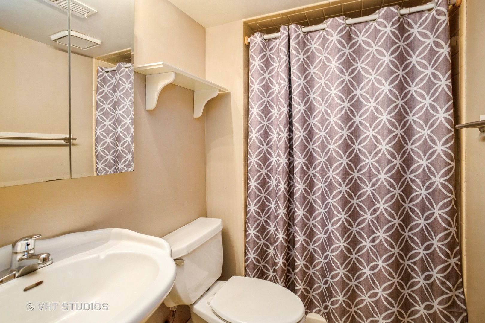 329 South Maple Street Itasca, IL 60143 - Photo 9 of 10 a white toilet sitting next to a white curtain