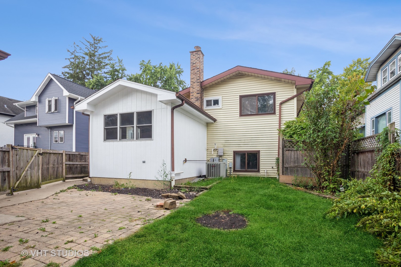 329 South Maple Street Itasca, IL 60143 - Photo 10 of 10 a front view of a house with a yard and garage