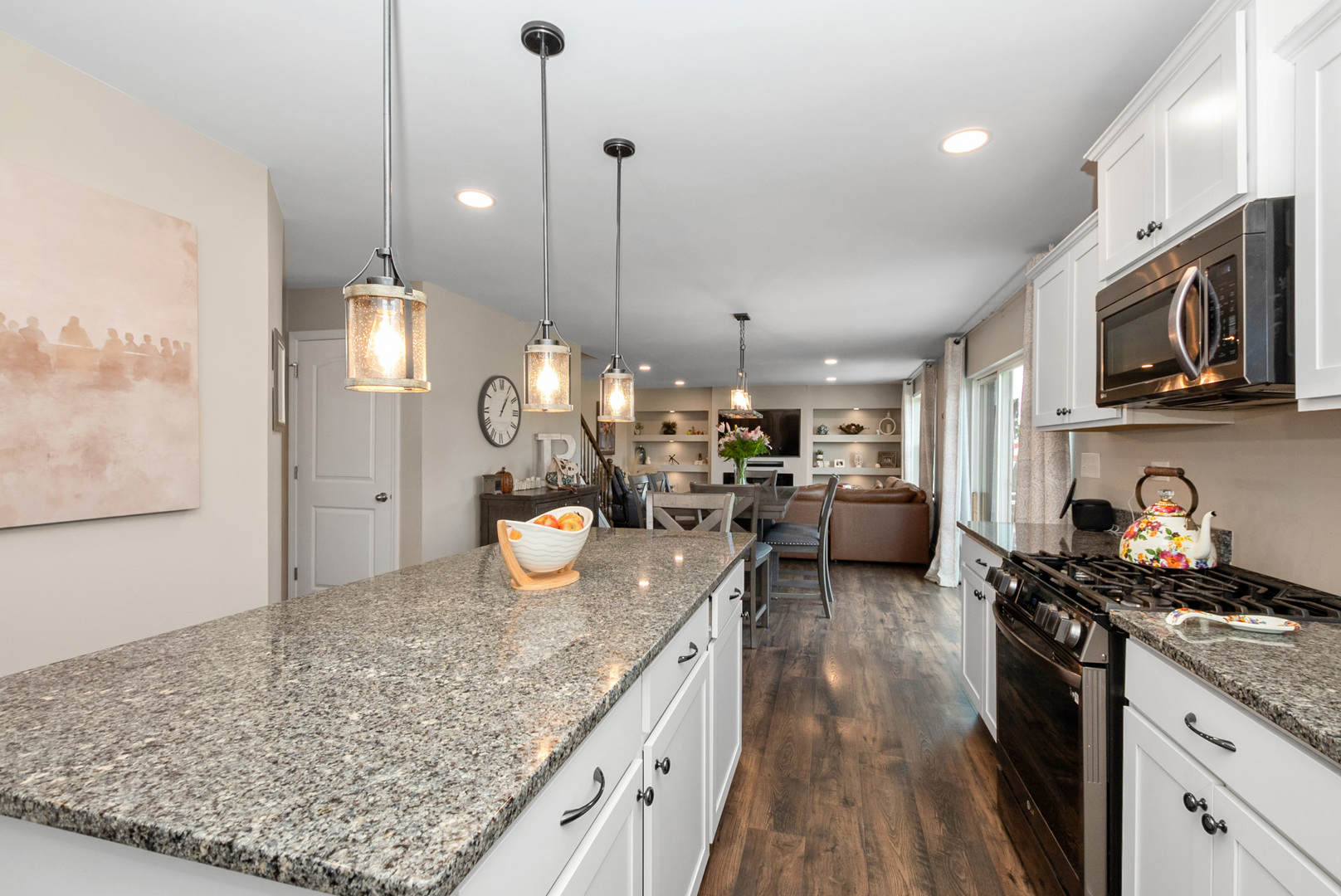 1981 Stapleton Road New Lenox, IL 60451 - Photo 14 of 33 a kitchen with stainless steel appliances granite countertop a sink stove and refrigerator