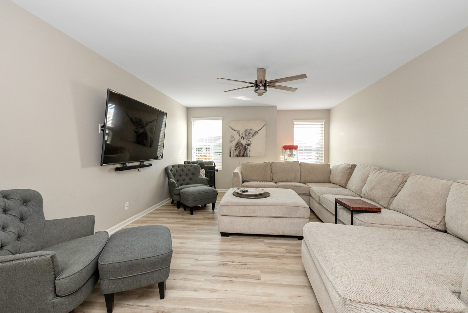 1981 Stapleton Road New Lenox, IL 60451 - Photo 16 of 33 a living room with furniture a flat screen tv and a window