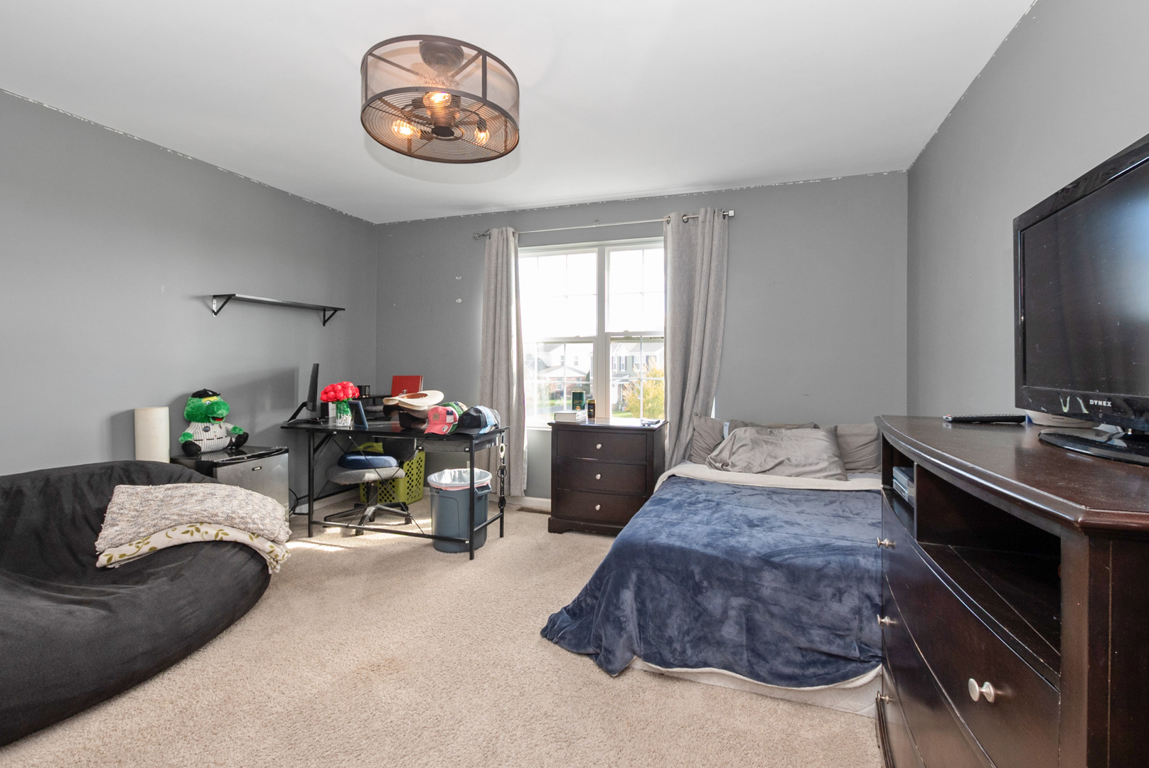 1981 Stapleton Road New Lenox, IL 60451 - Photo 17 of 33 a living room with furniture and a flat screen tv