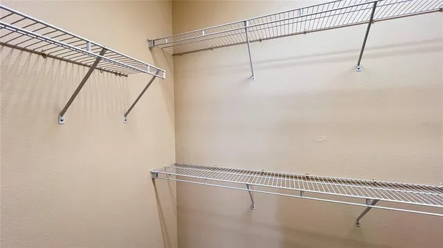 a view of a room with racks on the wall