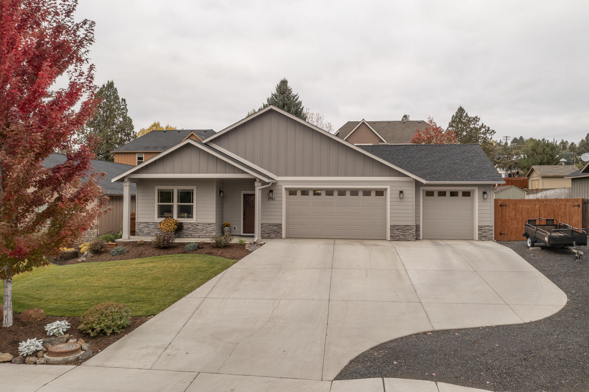 2745 Southwest 32nd Street Redmond, OR 97756 - Photo 1 of 28 Front Exterior - Three Car Garage!