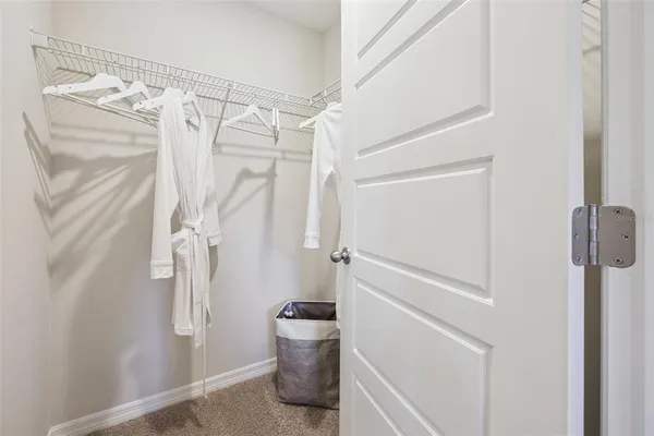 a bathroom with a shower toilet and tub