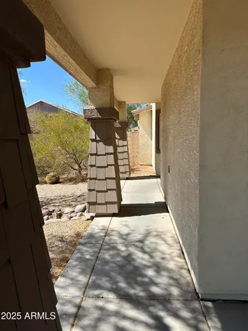 a bedroom with furniture and window