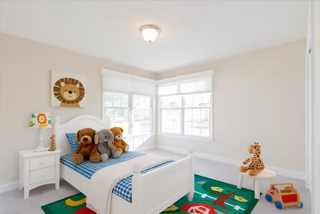 a balcony with table and chairs