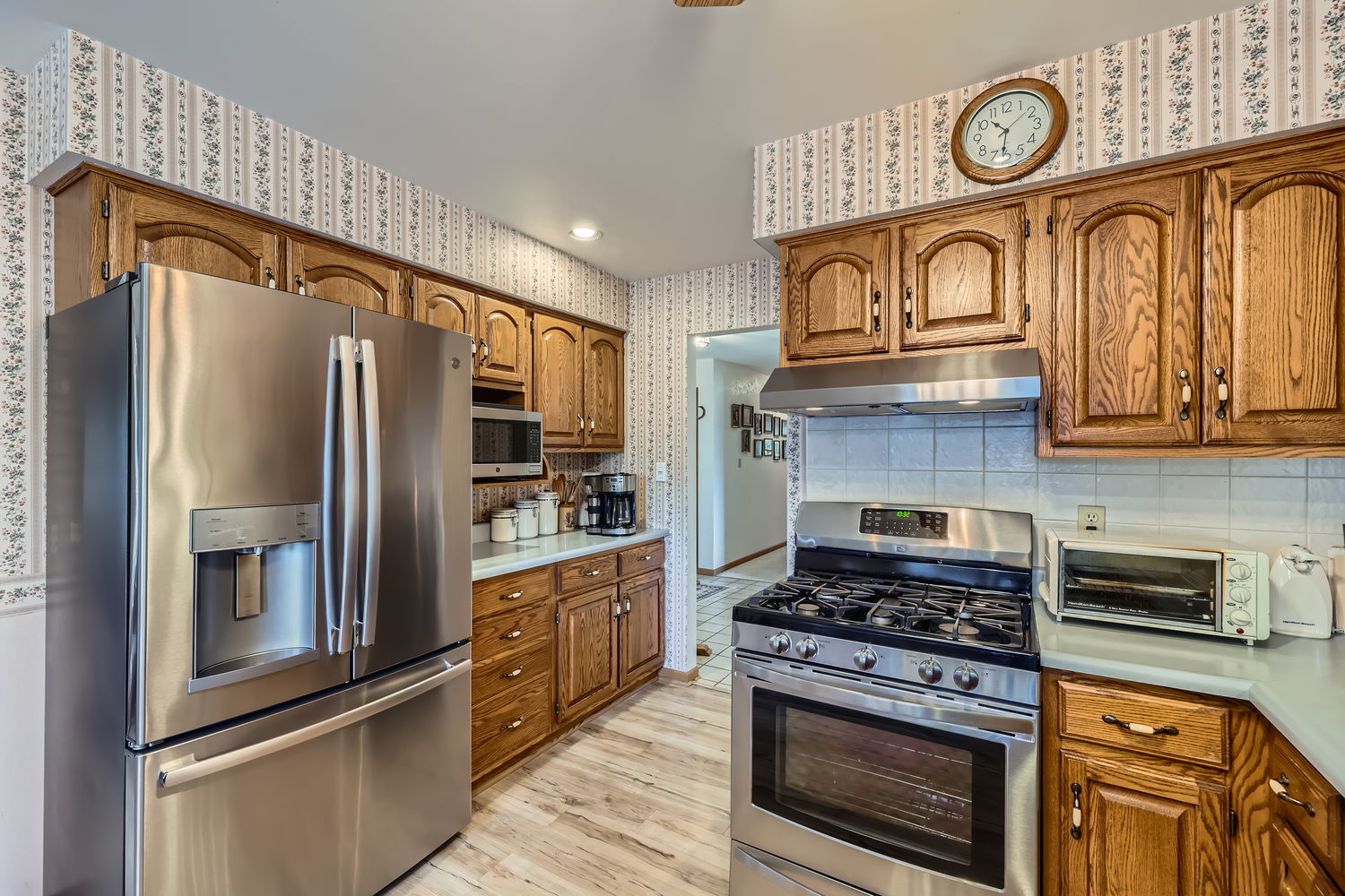 620 Morningside Point Elgin, IL 60123 - Photo 11 of 32 a kitchen with stainless steel appliances granite countertop a stove a refrigerator and a refrigerator