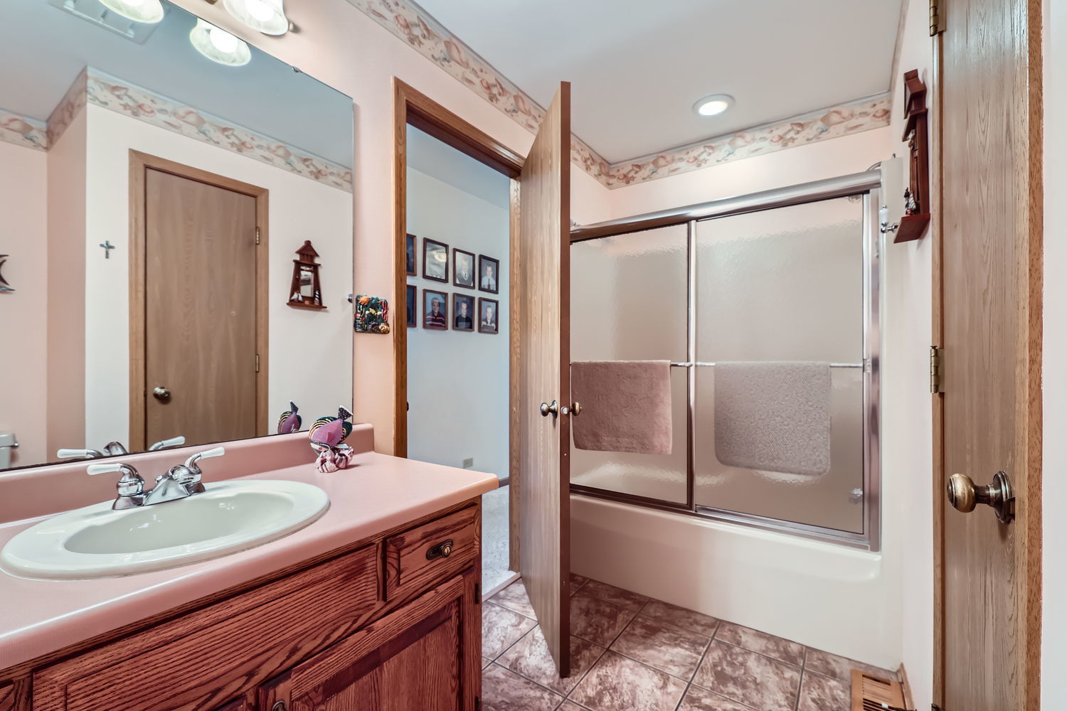 620 Morningside Point Elgin, IL 60123 - Photo 24 of 32 a bathroom with a double vanity sink mirror and shower