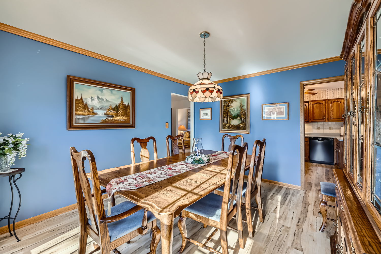 620 Morningside Point Elgin, IL 60123 - Photo 8 of 32 a dining room with furniture a chandelier and wooden floor