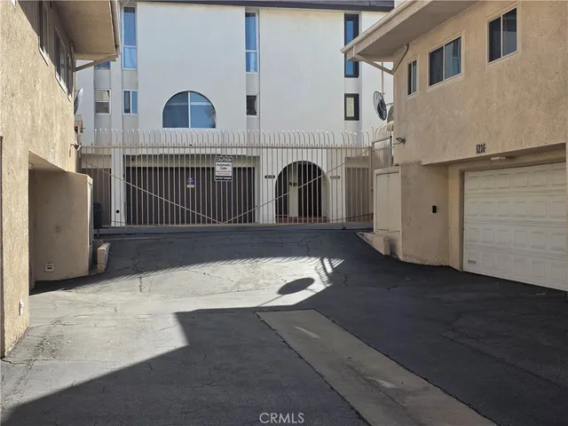 a view of front door of house with stairs